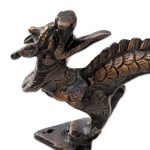 Close up of dragon head door handle